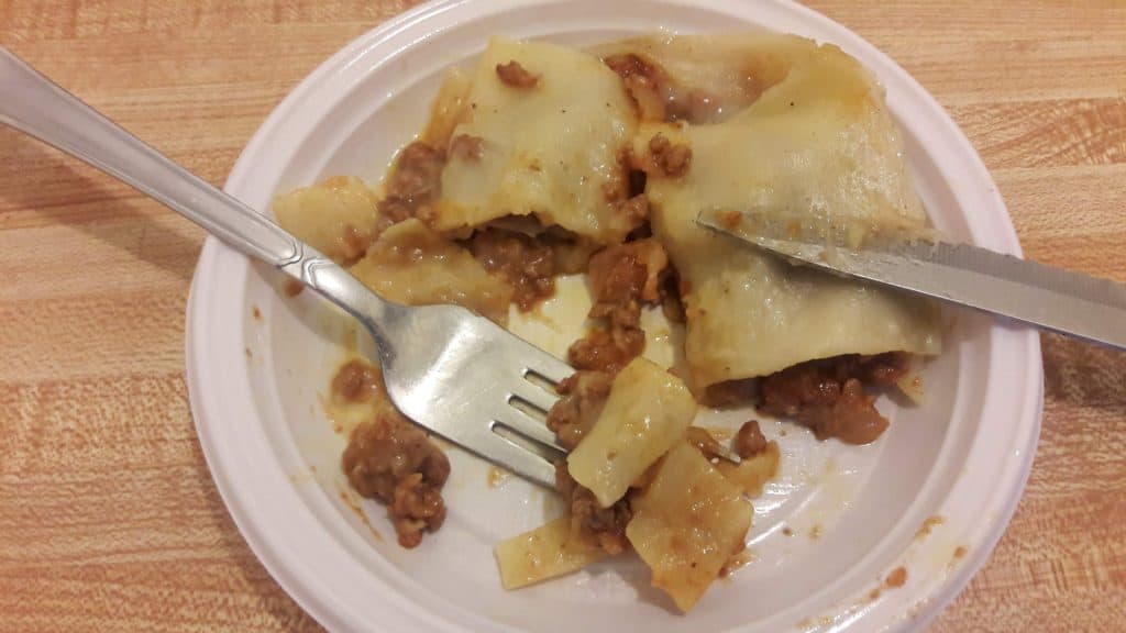 A plate with some cut up meat lasagna on it ~ bitesnpieces.co