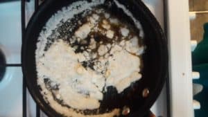 Hard sugar lumps in the pan.