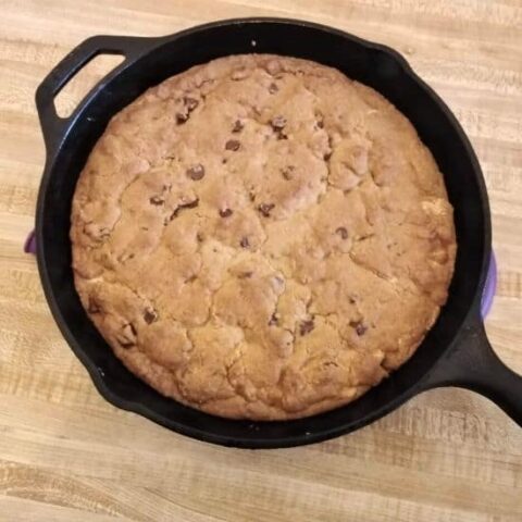 Baked peanut butter chocolate chip skillet cookie.
